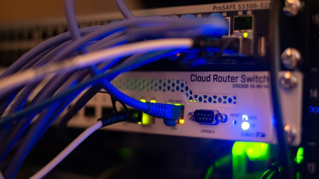 Networking equipment with ethernet cables for DNS and hosting setup